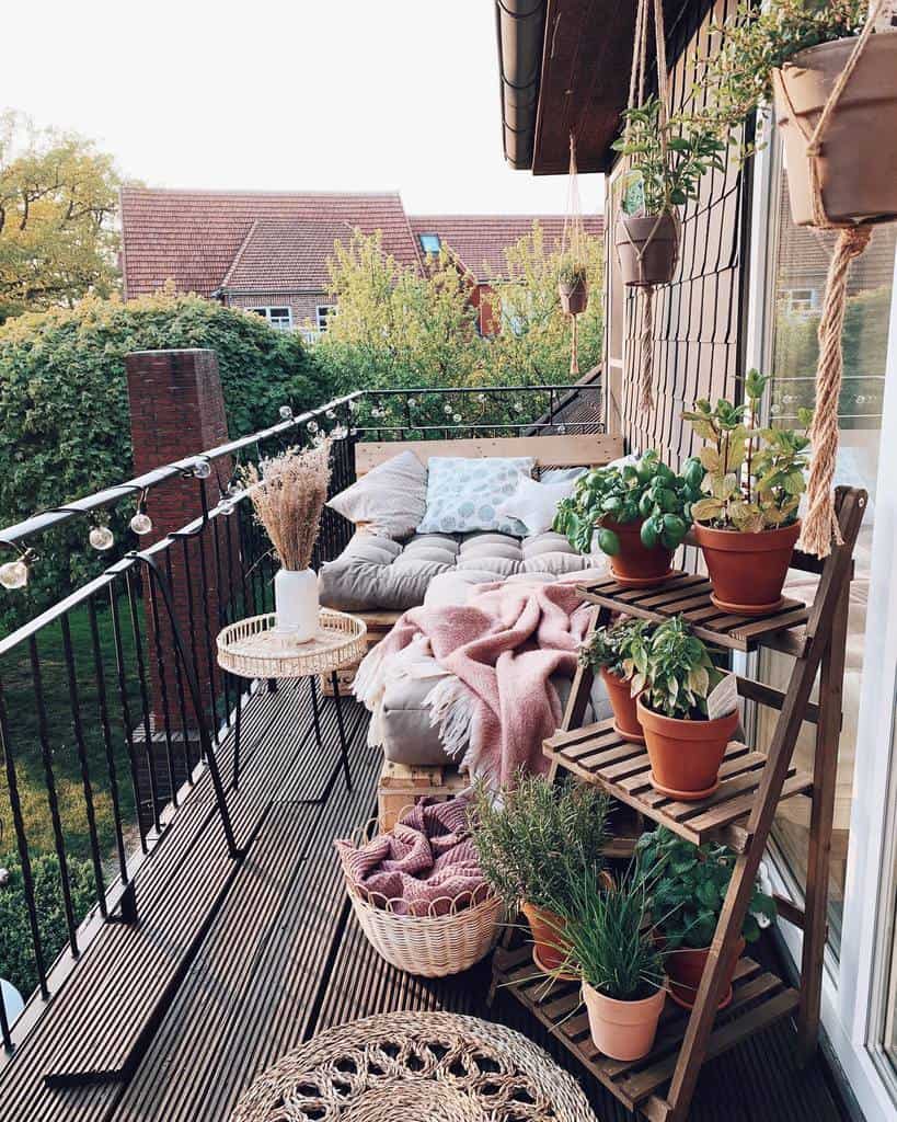 small wood deck pot plants pallet couch