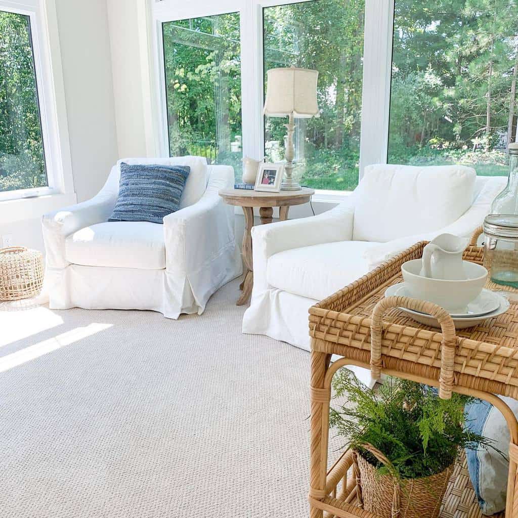 white sofas in carpet sunroom 