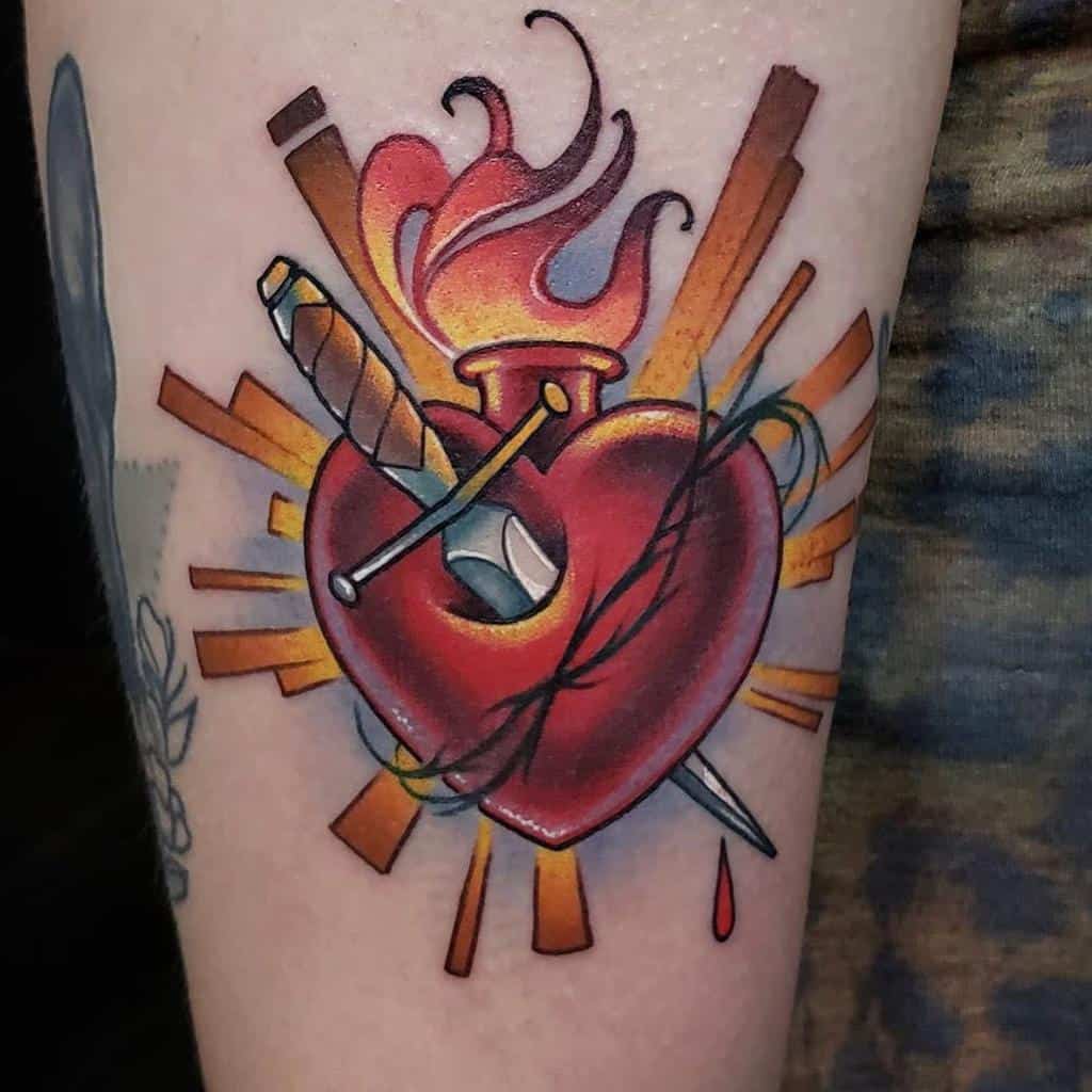 Dagger Bleeding Heart Tattoo codeofconducttattoo
