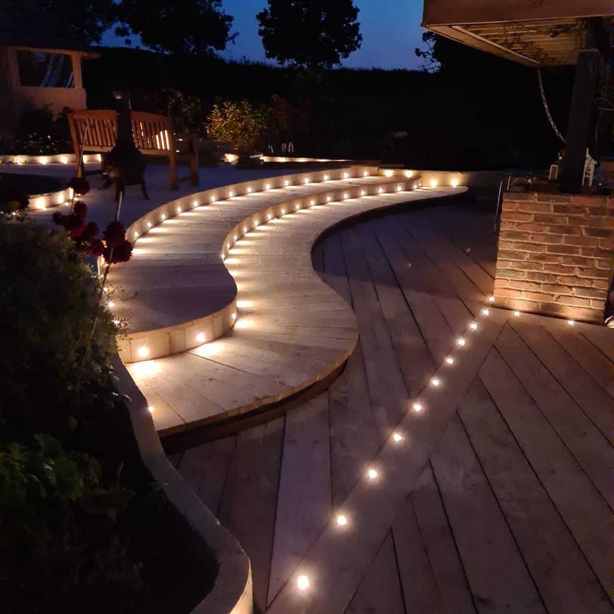 tired wood deck led lighting brick accent wall