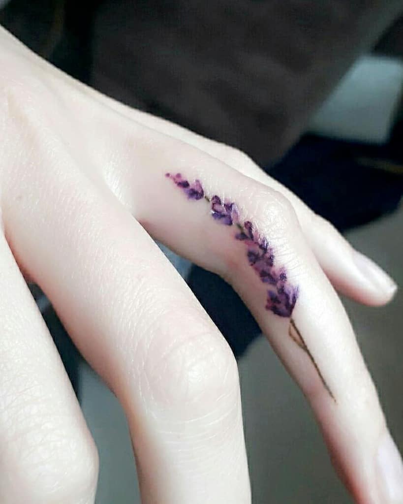 Delicate Flower Finger Tattoos inky_wood_ribbons