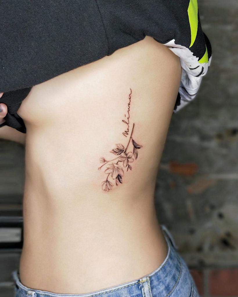Delicate Flower Rib Tattoos eddie0115_tattoo