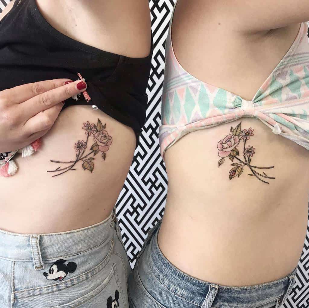 Delicate Flower Rib Tattoos sarahwilde.tattoos