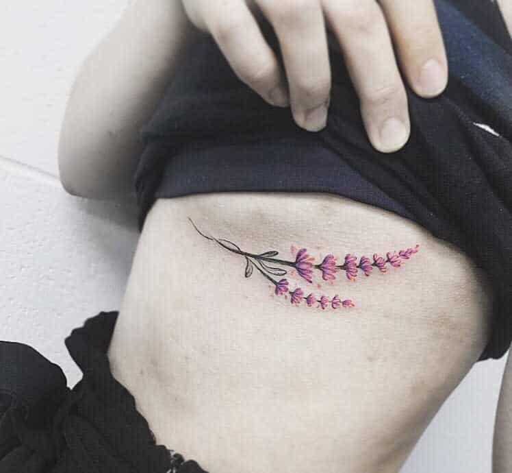 Delicate Flower Rib Tattoos terran.tattooart_css