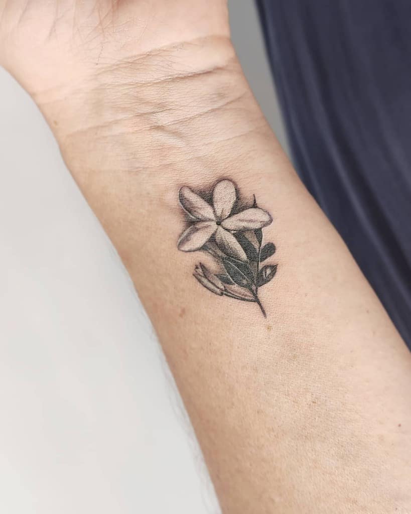 Delicate Flower Wrist Tattoos medusaink_