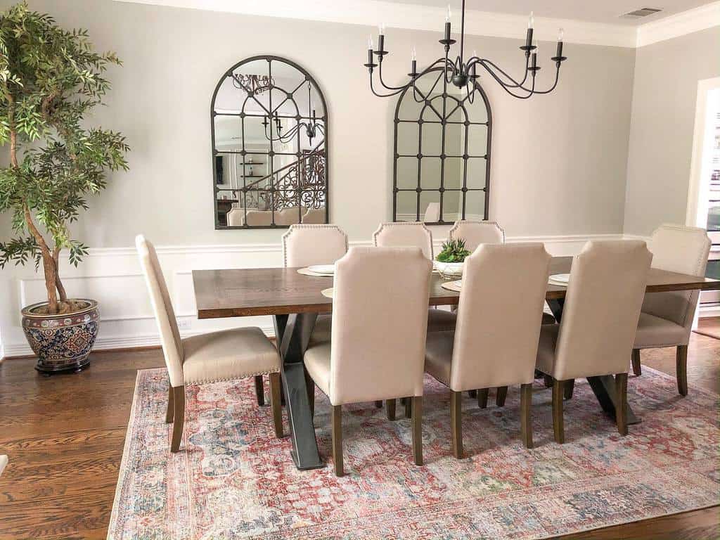 rustic dining room with table and candle chandelier