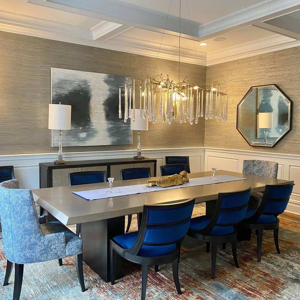 luxury dining room with long table and blue chairs 