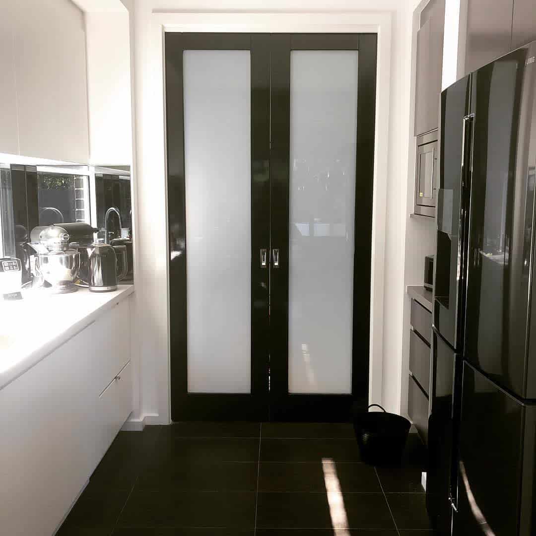 black frosted glass sliding door butler's pantry