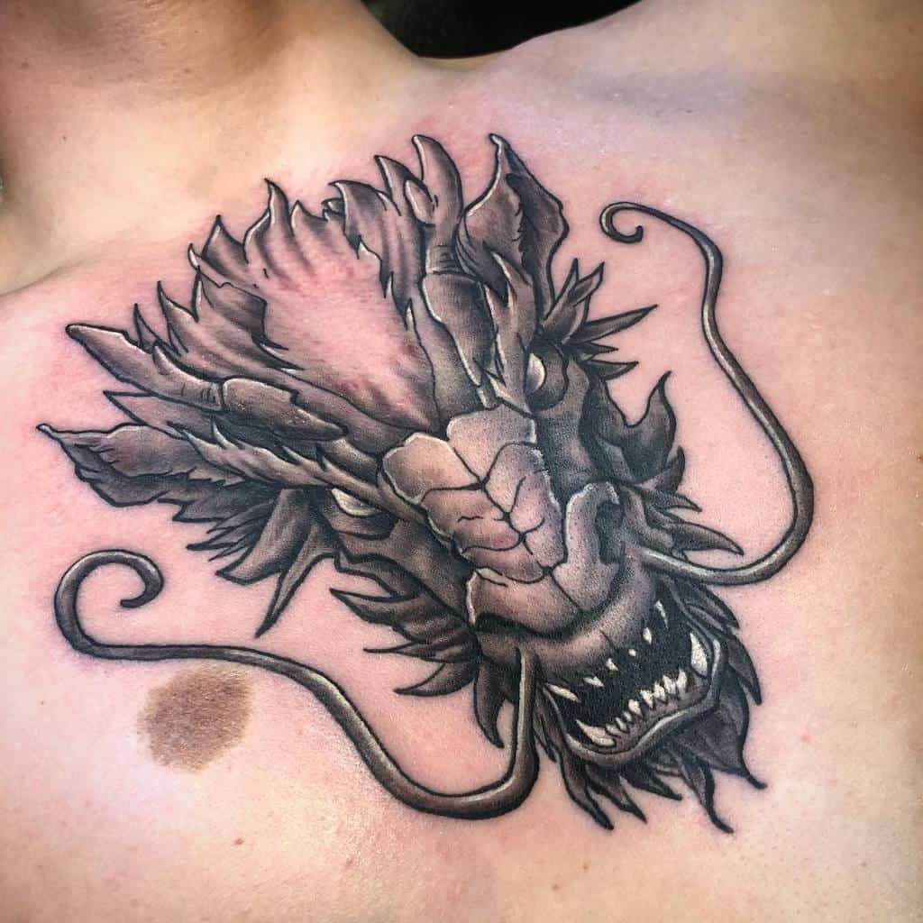 Dragon Head Chest Tattoo placido_ink