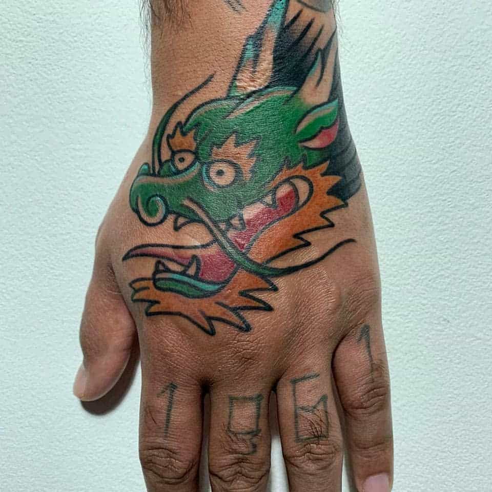Dragon Head Hand Tattoo calabro.tattoos