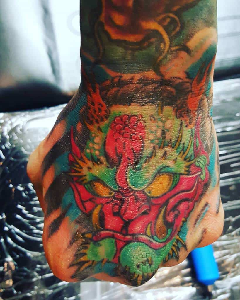 Dragon Head Hand Tattoo tattoos.by.jp