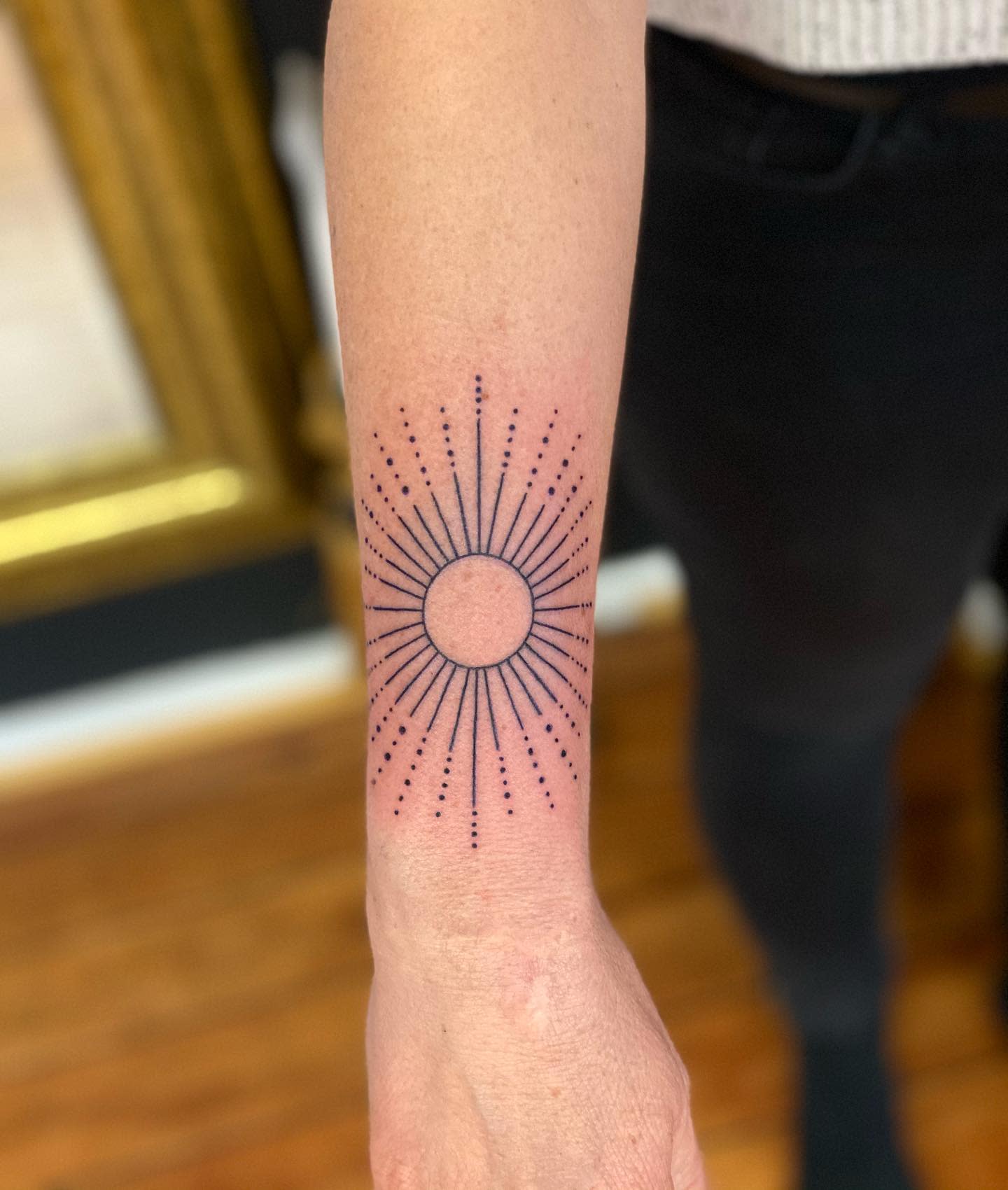 Fine line sun tattoo in Calgary  Viktoriia Ink