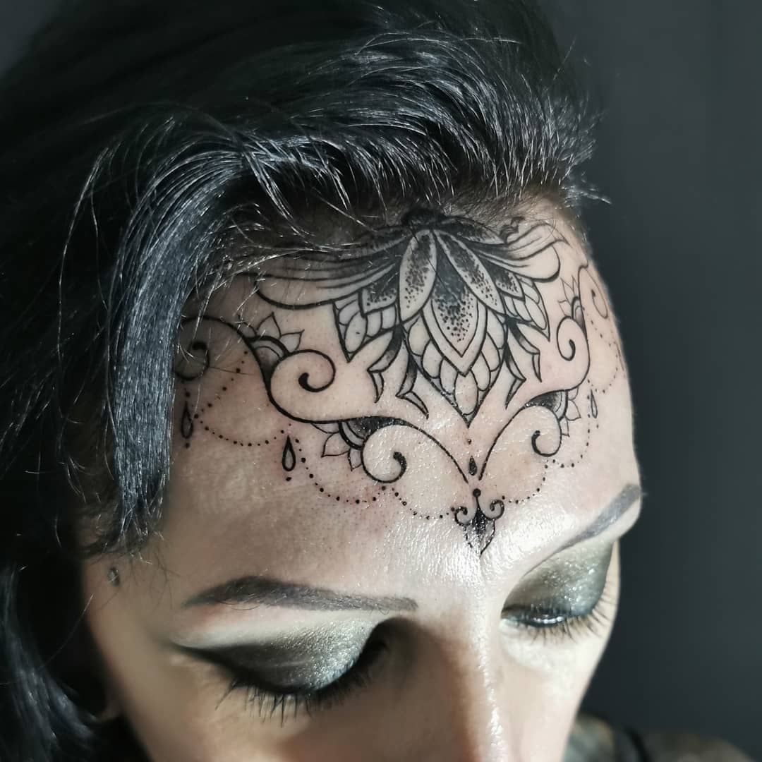 Ornamental Forehead Tattoo -flossydoestattoos