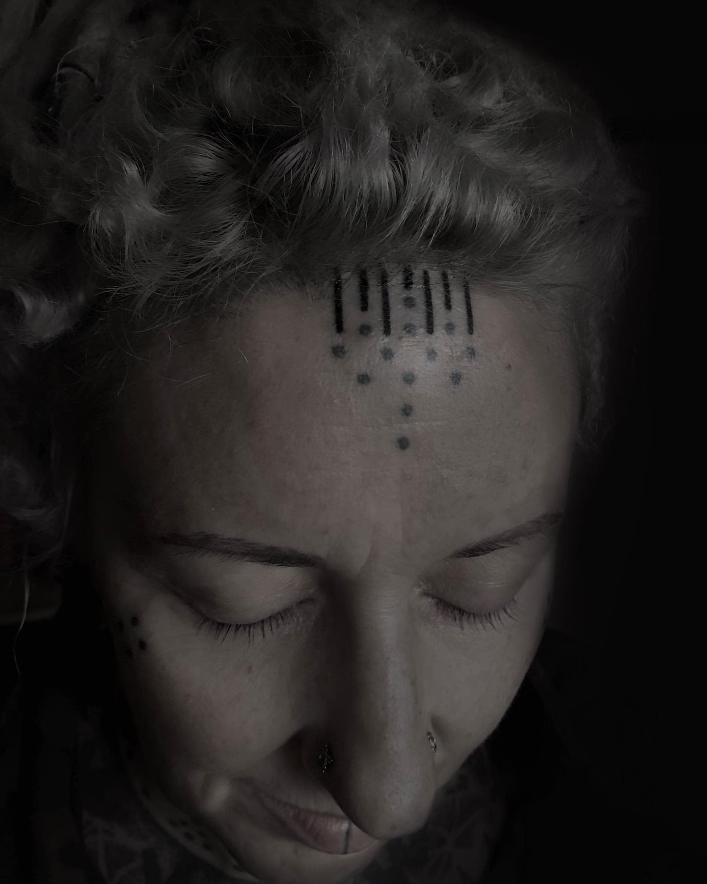 Simple Forehead Tattoo -deitytattoo