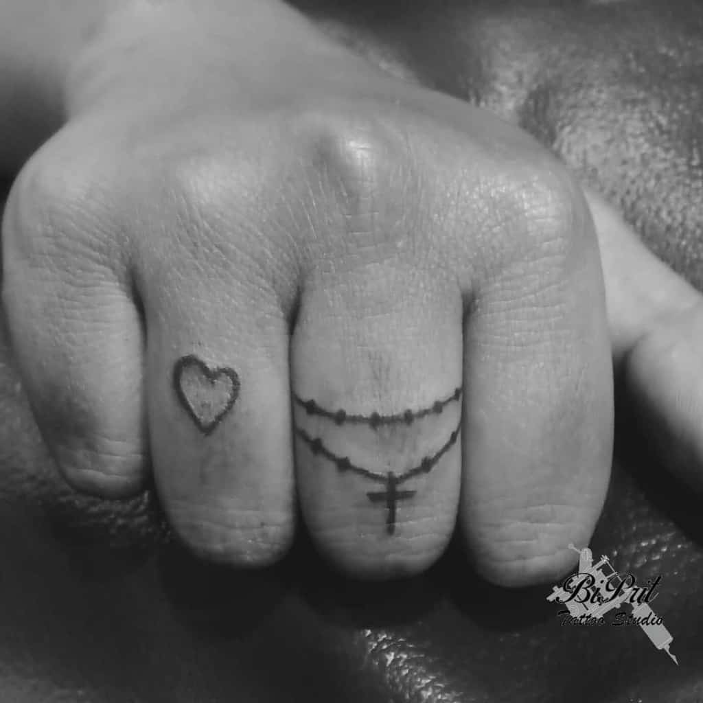 Heart Outline Finger Tattoo biprit_tattoo_studio