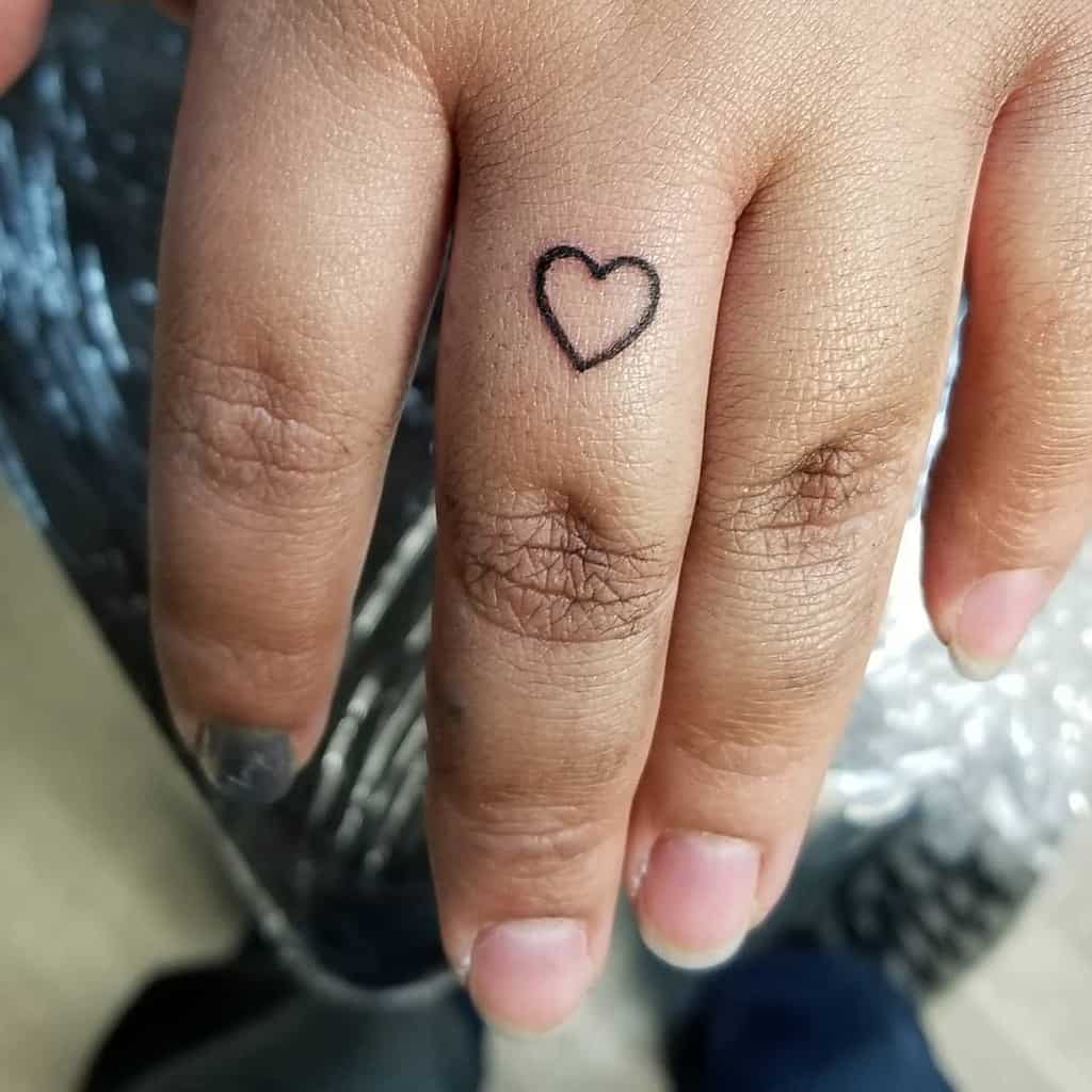 Heart Outline Finger Tattoo daniel_body_piercer
