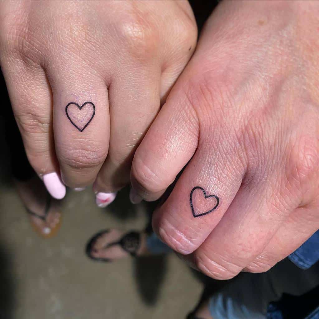 Heart Outline Finger Tattoo justincariaga