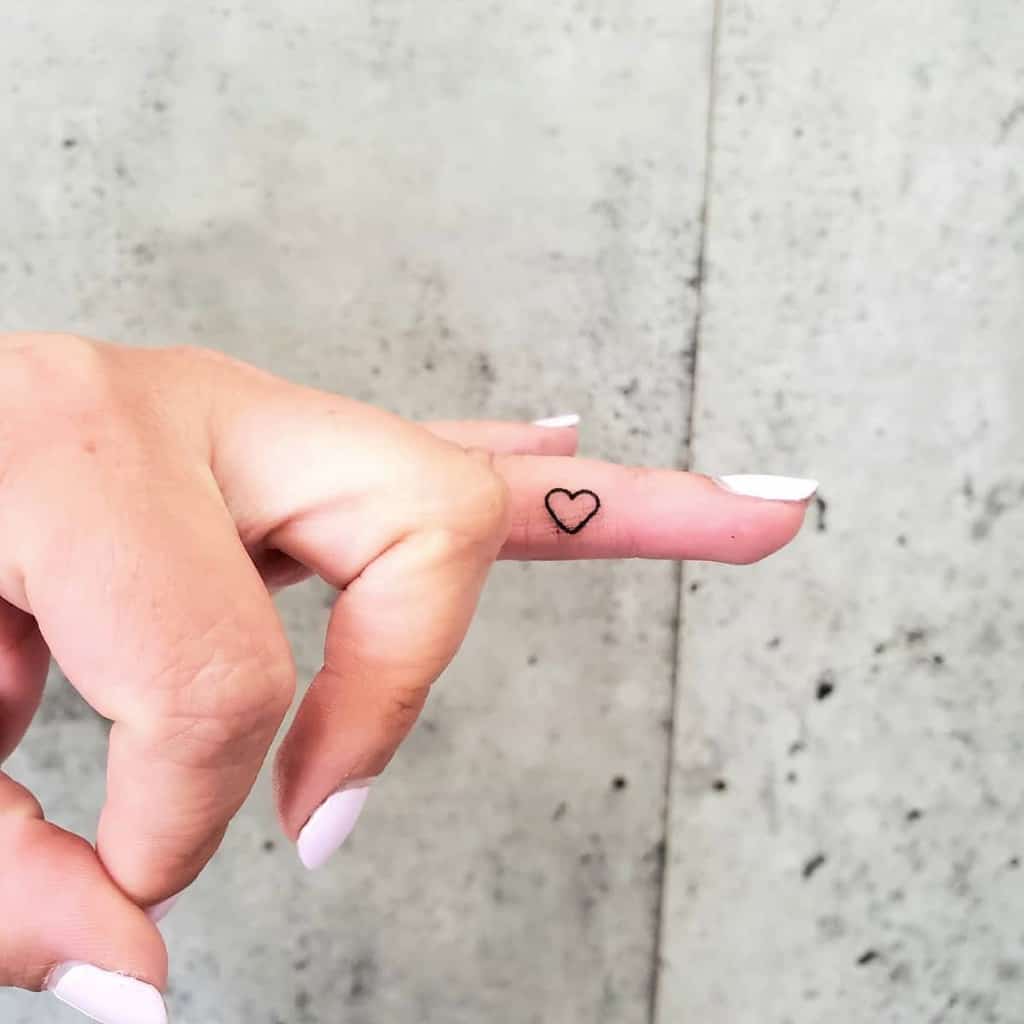 Heart Outline Finger Tattoo timelessinktoronto
