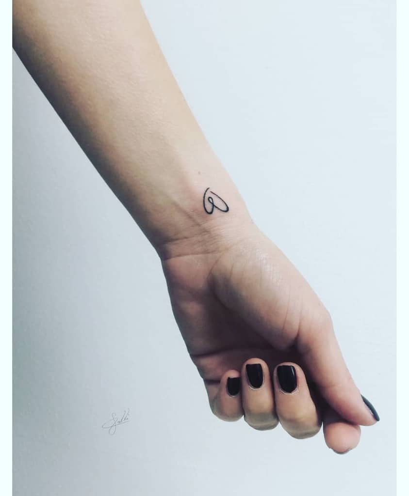Heart Outline Wrist Tattoo calli_tattoo