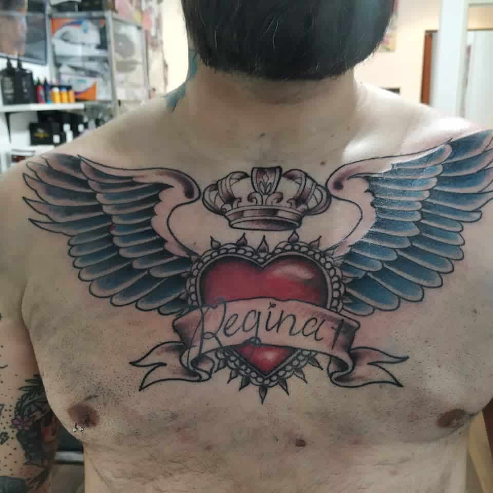 Heart With Wings Chest Tattoo daggers_tattoo