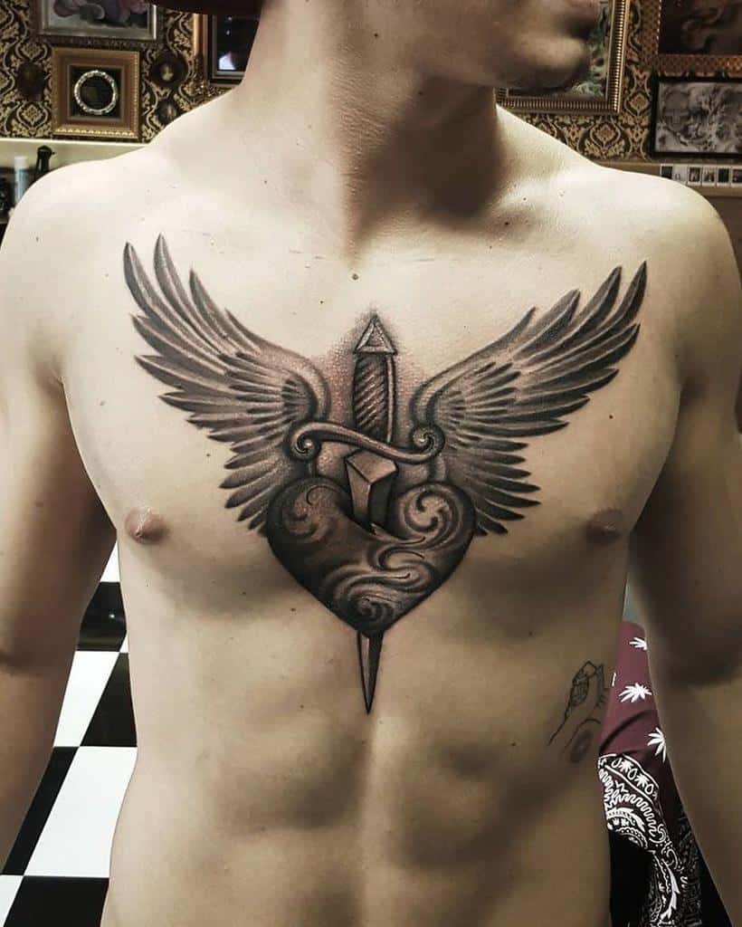 Heart With Wings Chest Tattoo enlopezz