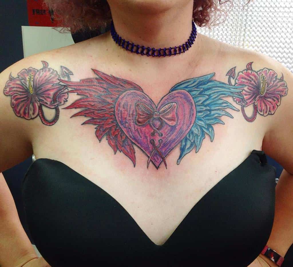 Heart With Wings Chest Tattoo mansruintattoo