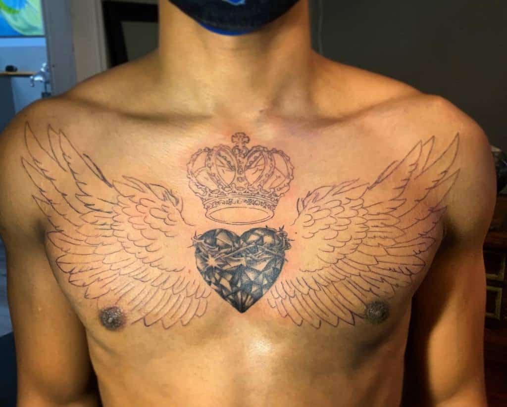 Heart With Wings Chest Tattoo radeo_ink