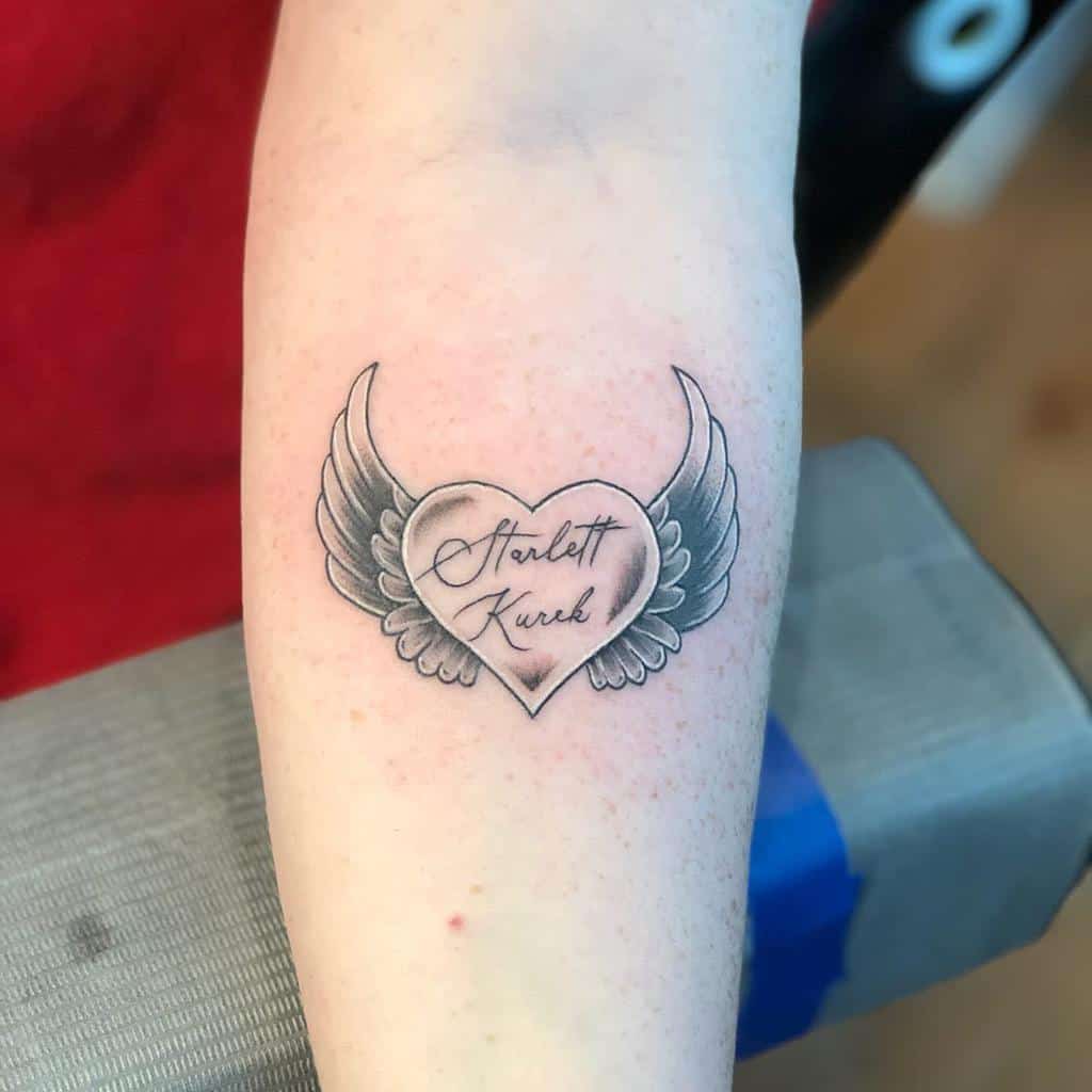 Heart With Wings Forearm Tattoo tattooingdad