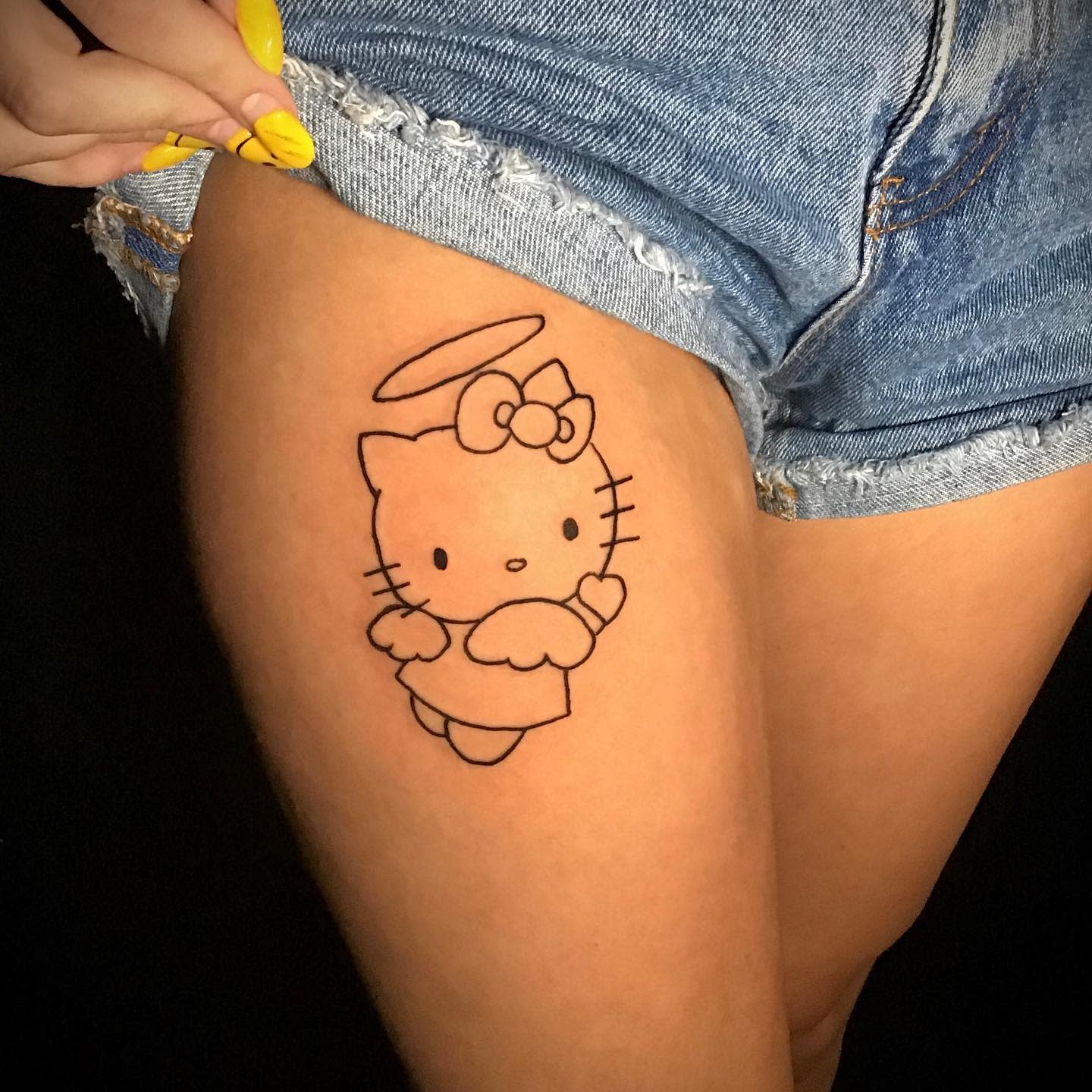 Hello Kitty Tattoo with Rainbow and Clouds