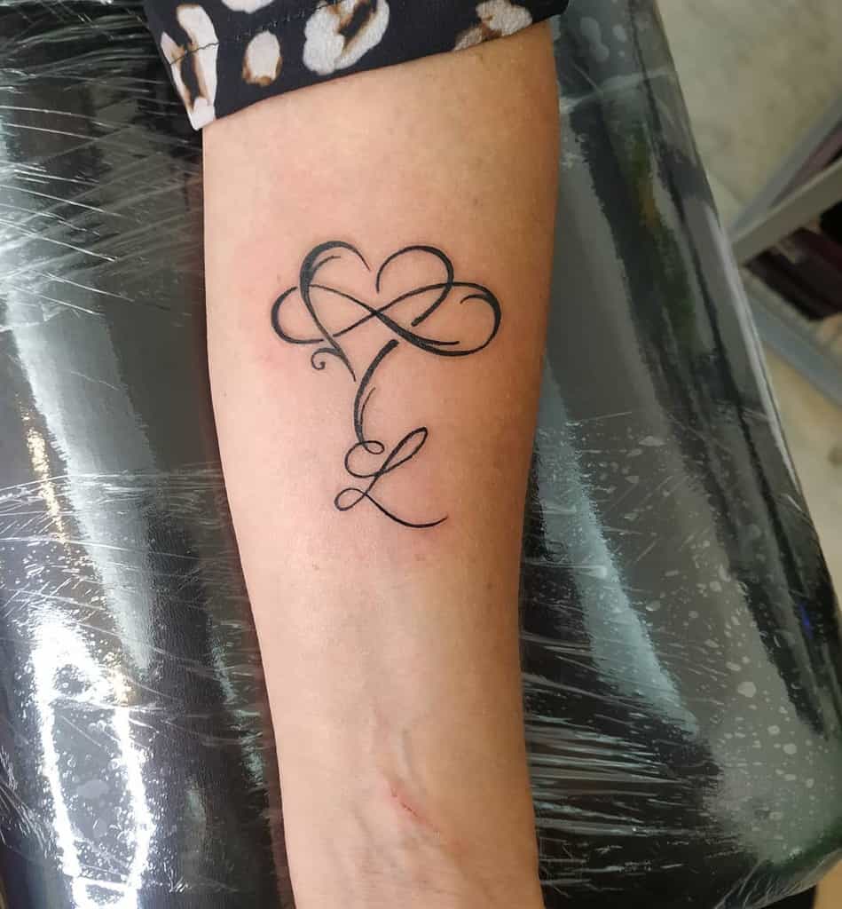 Infinity Heart Forearm Tattoo mestattoo_art