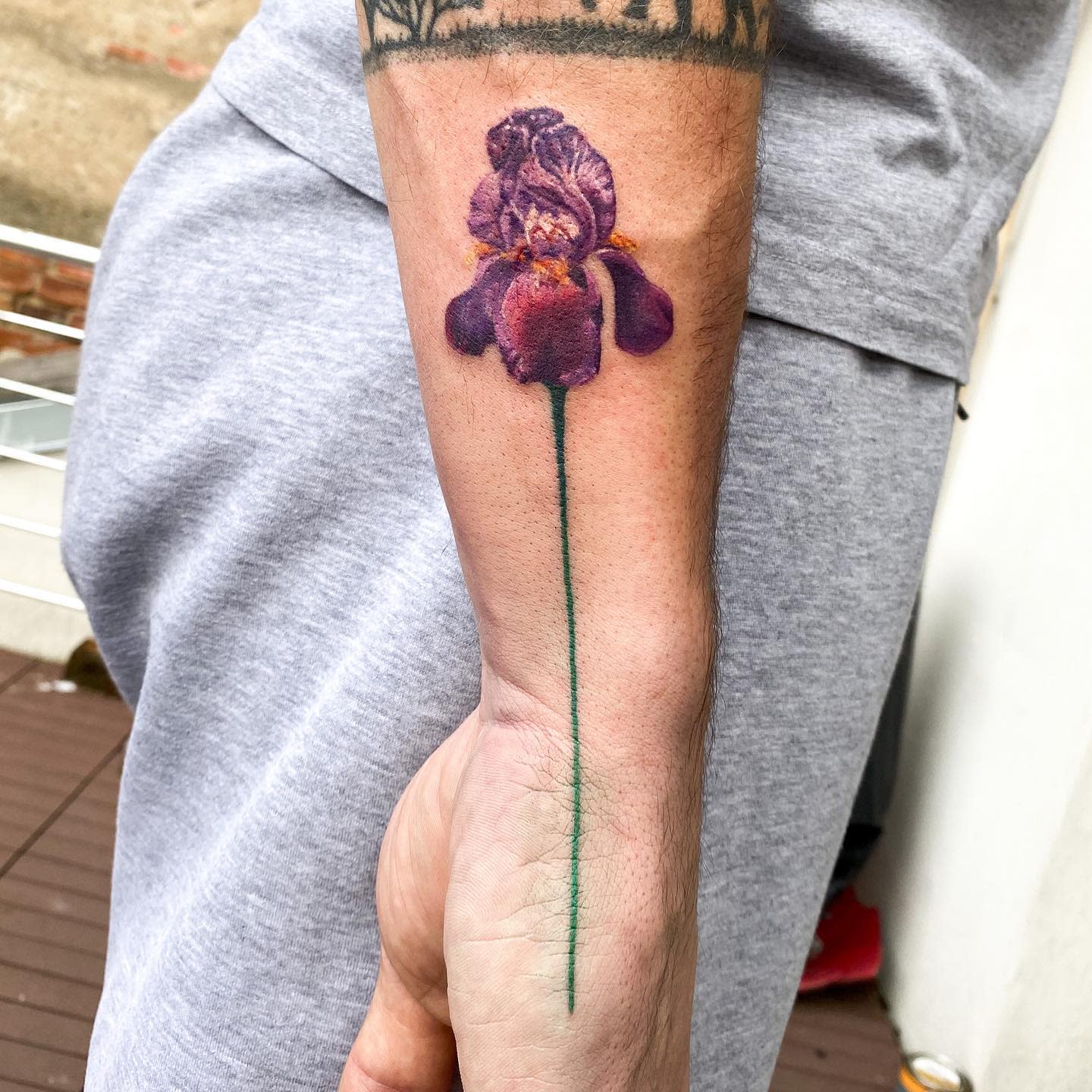 Tatuaje de iris realista -catsettembre