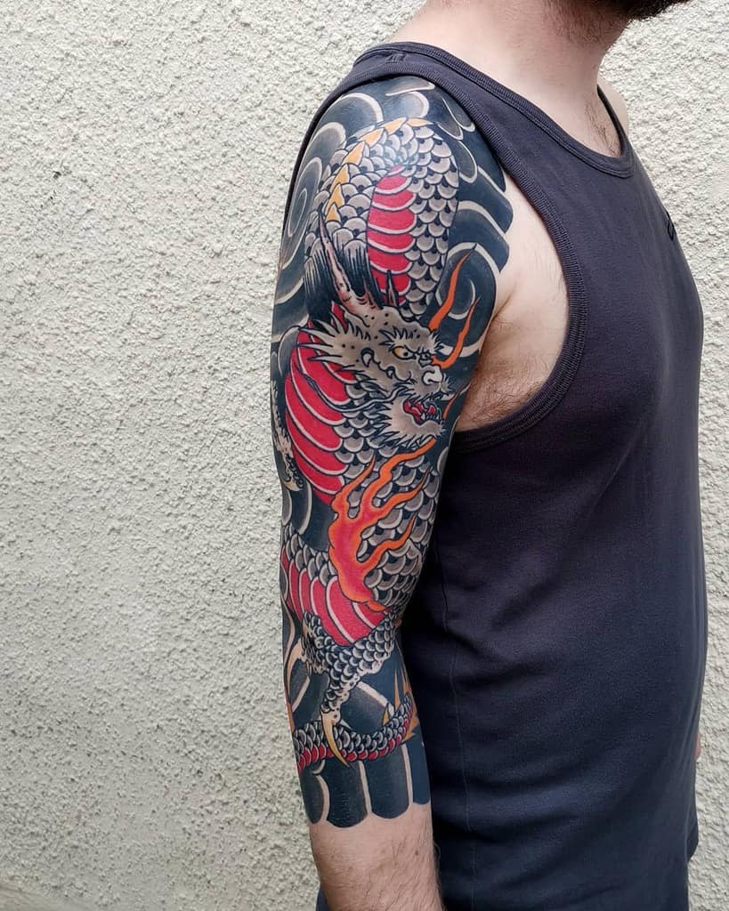 First session of 3/4 Kirin sleeve. Cover up of some previous work. Done by  Corey Beard of Steve's Tattoo in Madison WI : r/irezumi
