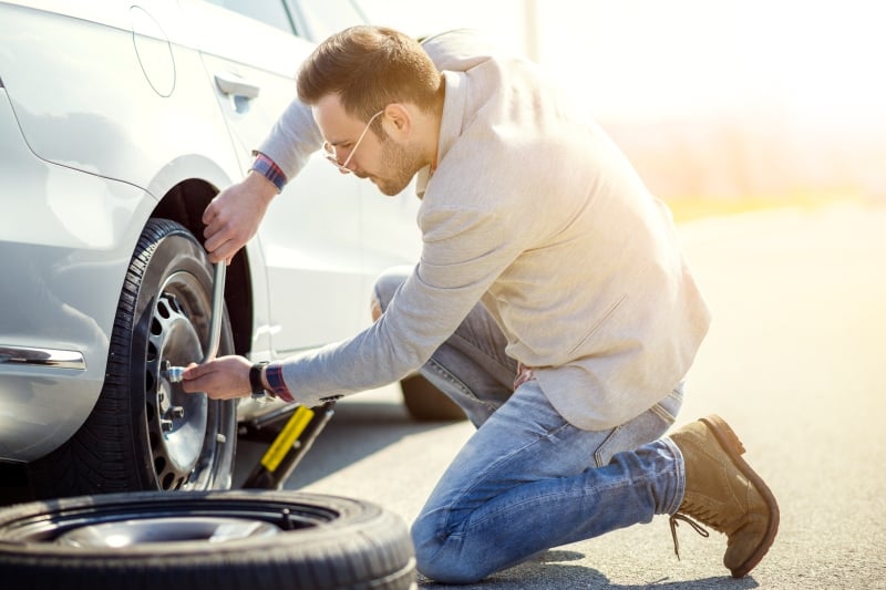 Know How to Change a Tire Road Trip Tip