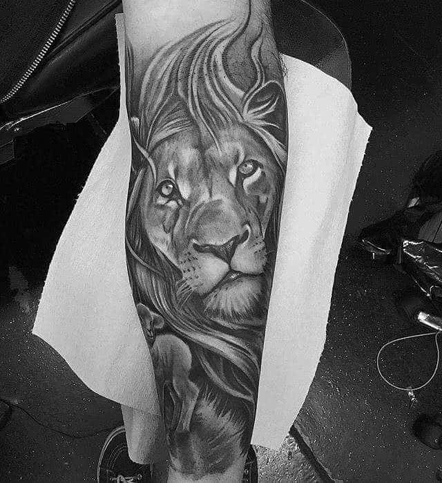 Lion and Lamb Forearm Tattoo emeraldtattoomodesto