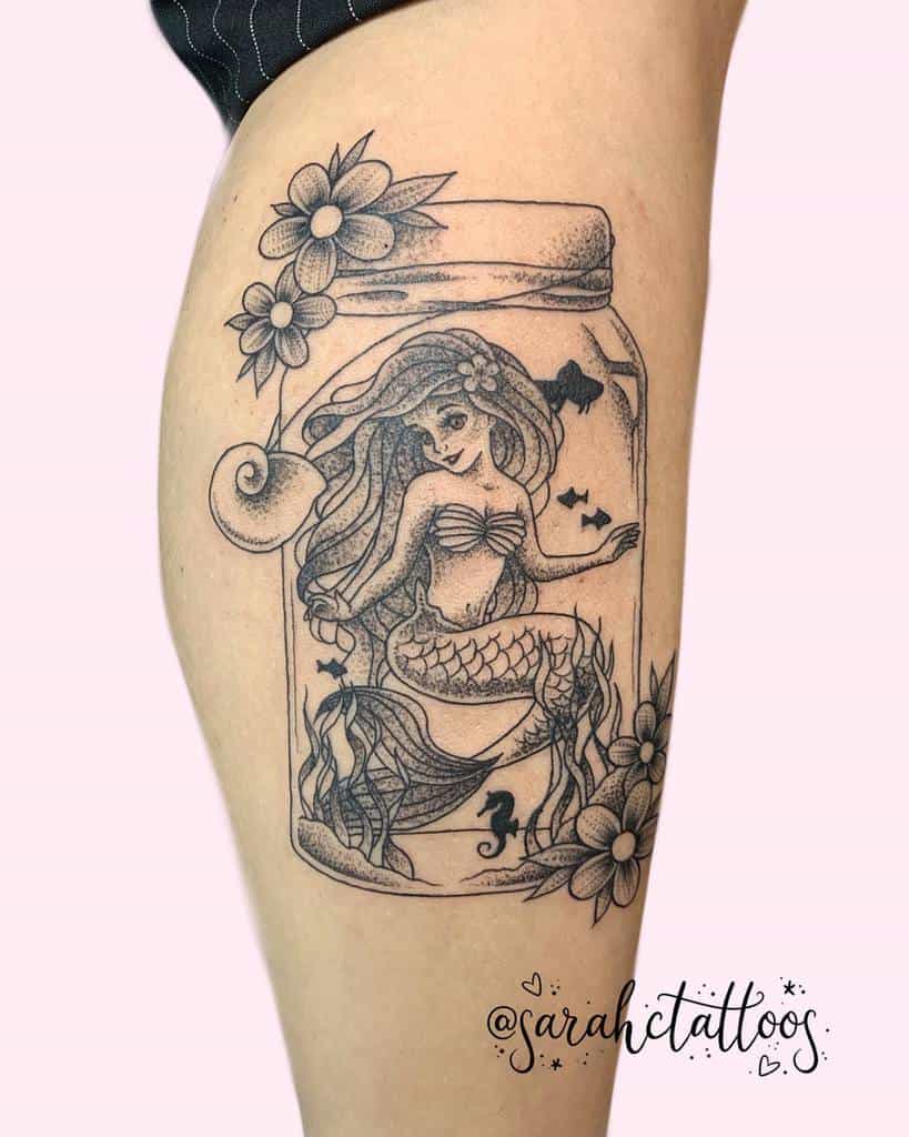Traditional Mermaid Thigh Tattoo - Tattoo Ideas and Designs | Tattoos.ai