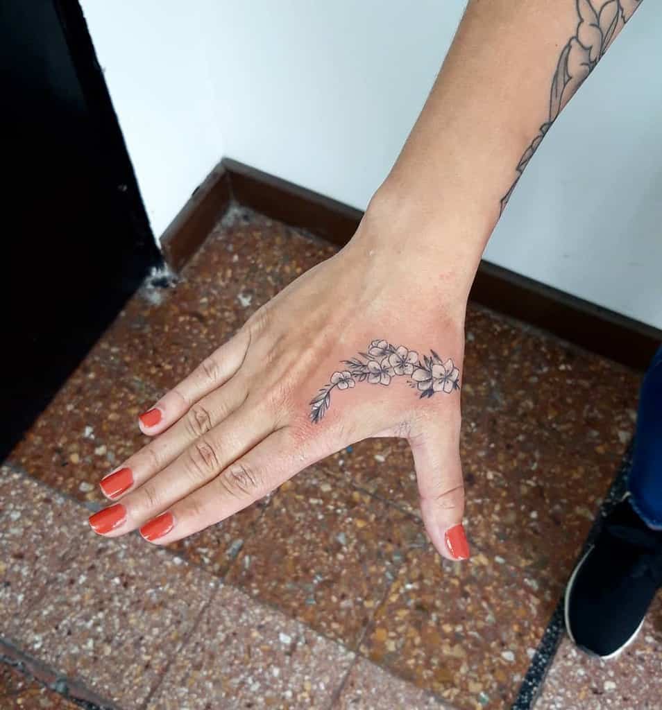 30 Amazing Hand Tattoos For Women The Most Popular  Latest Trends in  2023  Inked Celeb