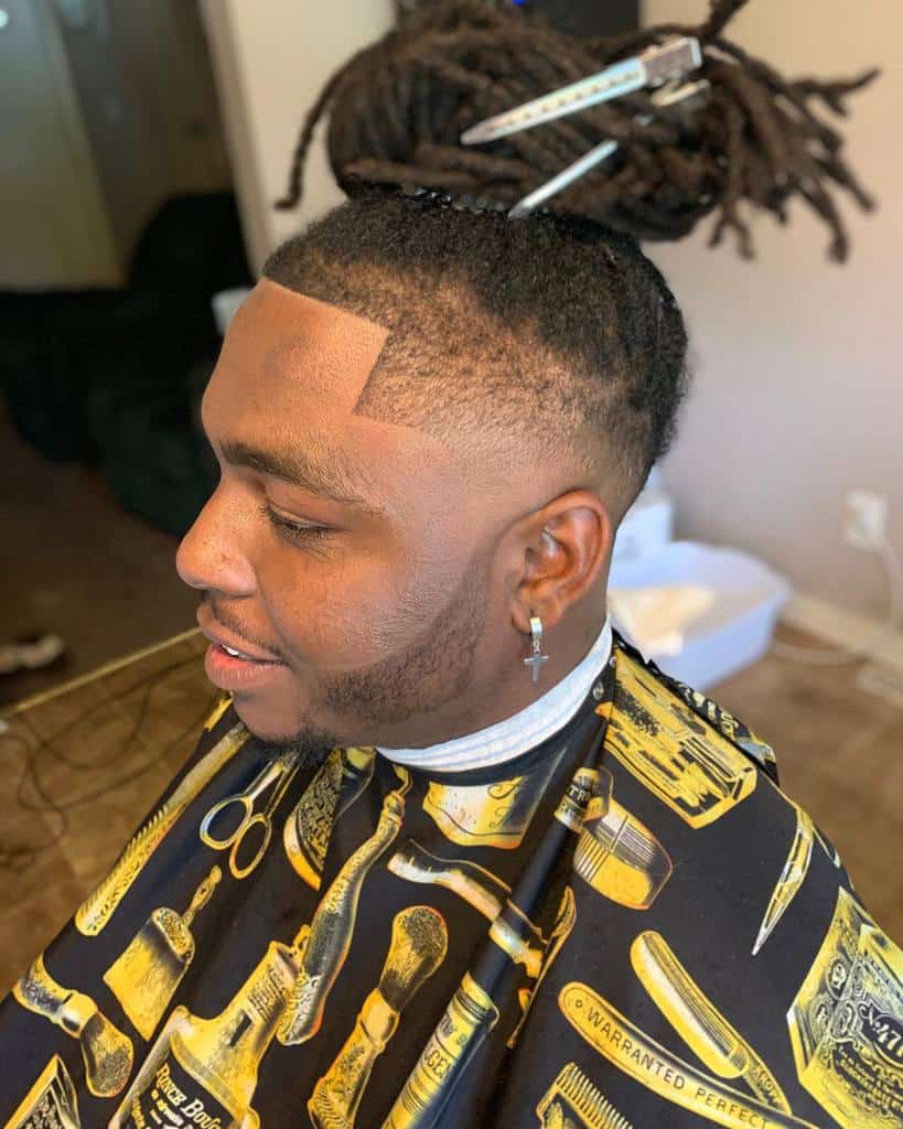 Men’s Ponytail Hairstyle With Dreads