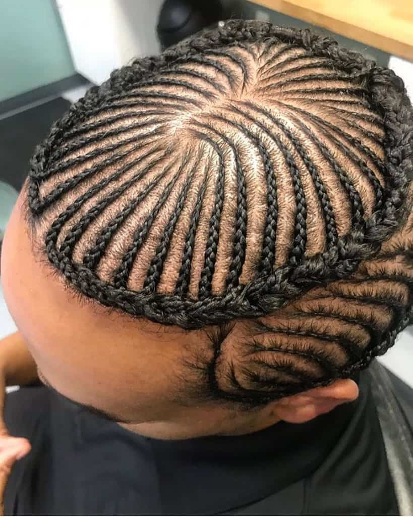 Men’s Cornrow Hairstyle Featuring Thin Cornrows On The Top And Thick Crown Braids Encircling The Cornrows