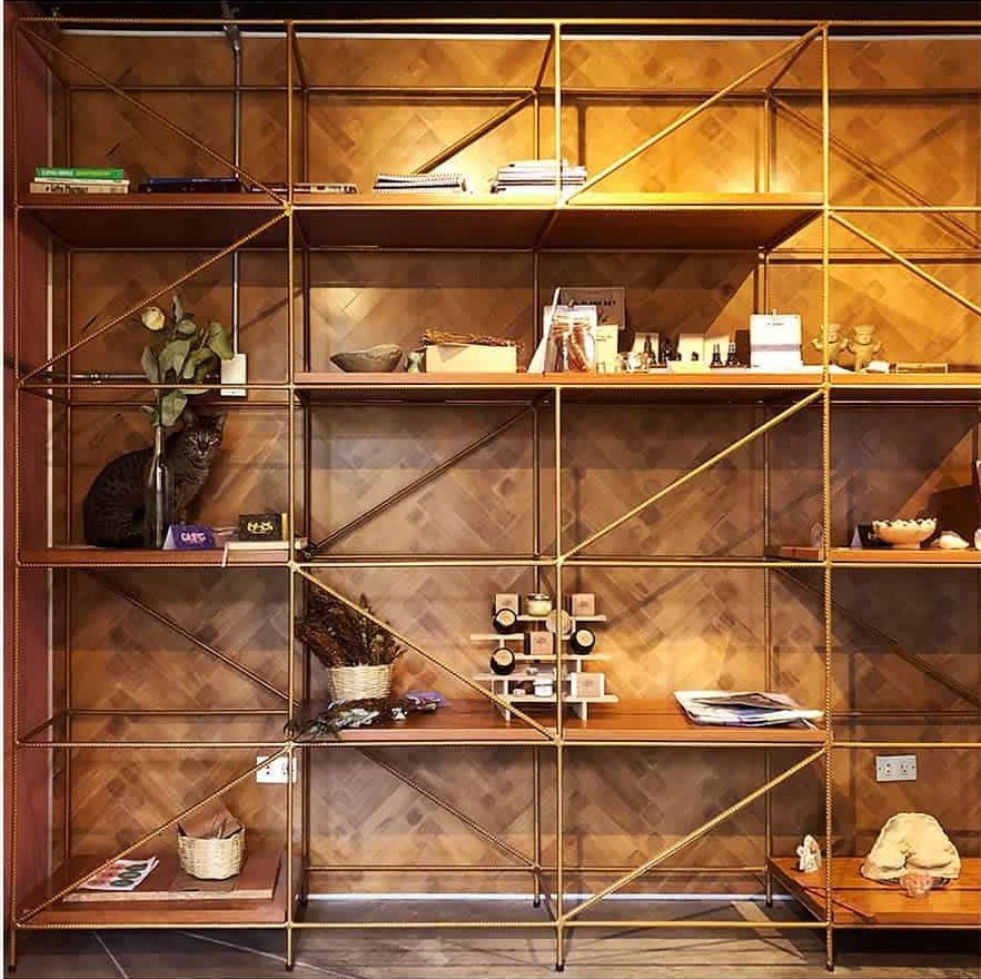 gold shelving unit in luxury home