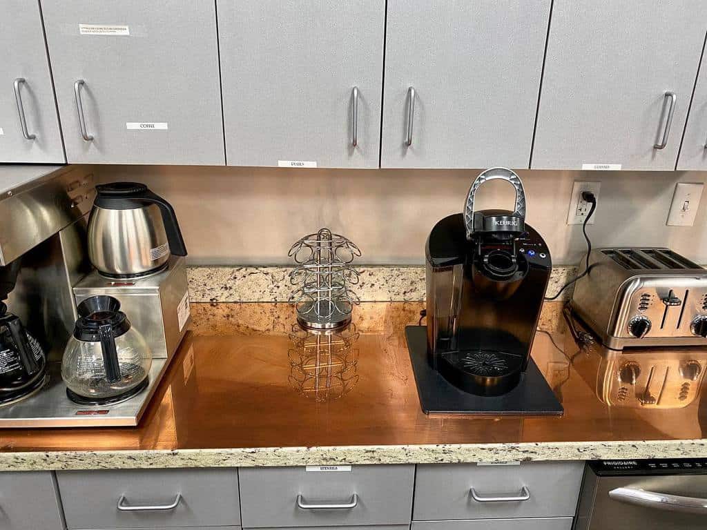 cooper kitchen countertop gray cabinets coffee machine 