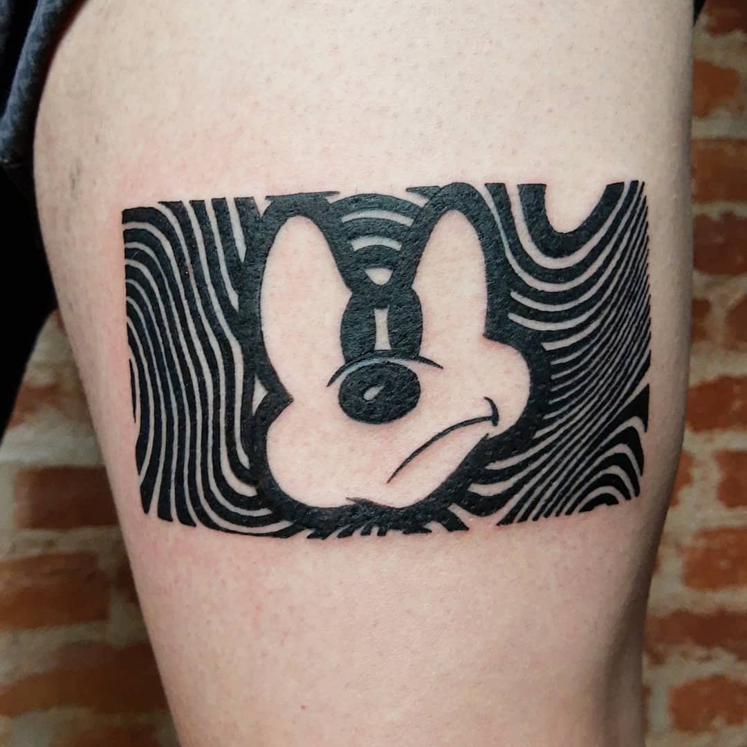 Small Mickey Mouse tattoo done on the inner arm