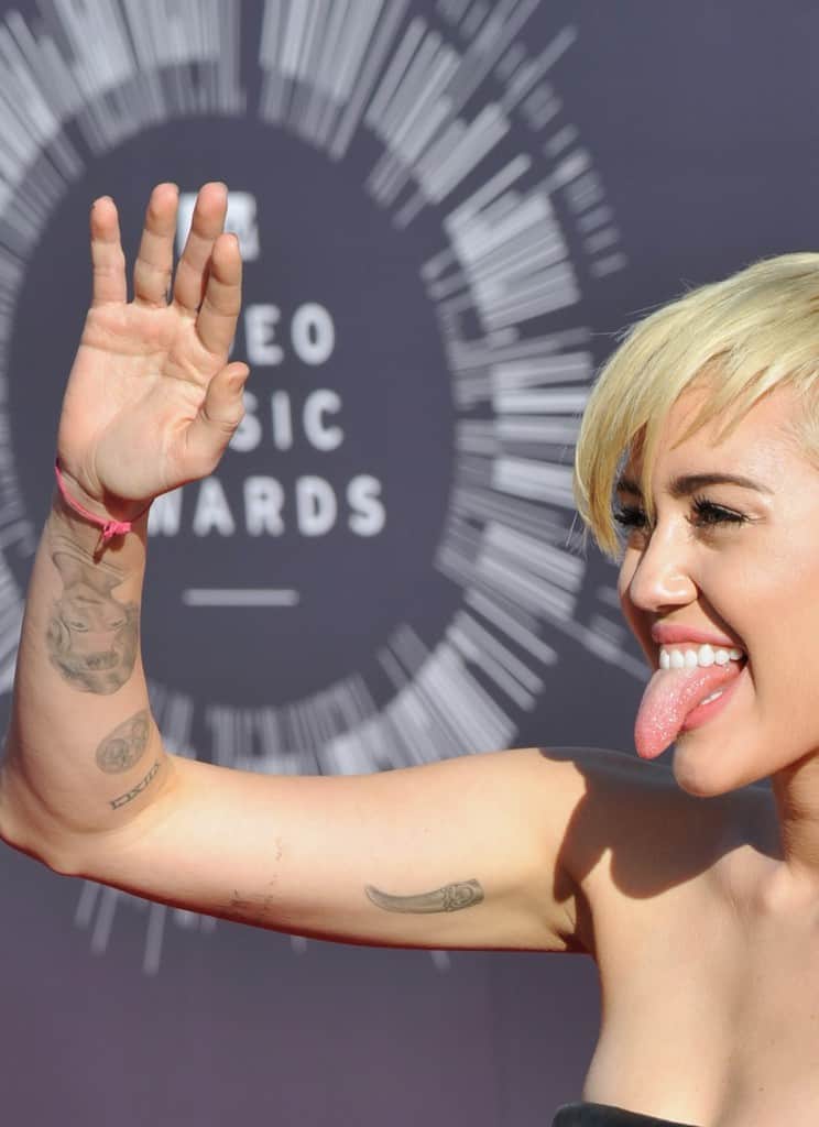 Miley Cyrus Gets New Liam HemsworthInspired Tattoo  YouTube