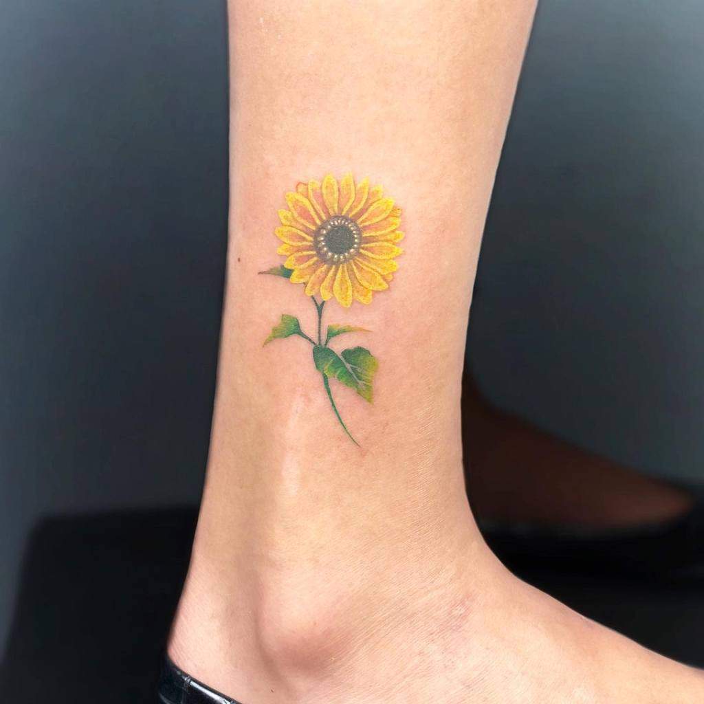 Minimalist Flower Ankle Tattoo diego_buddhatattoo