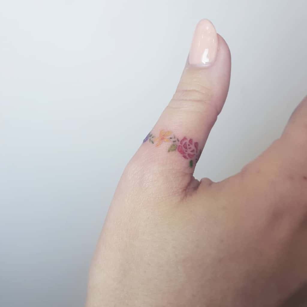 Minimalist Flower Finger Tattoo 2 sherriaustria