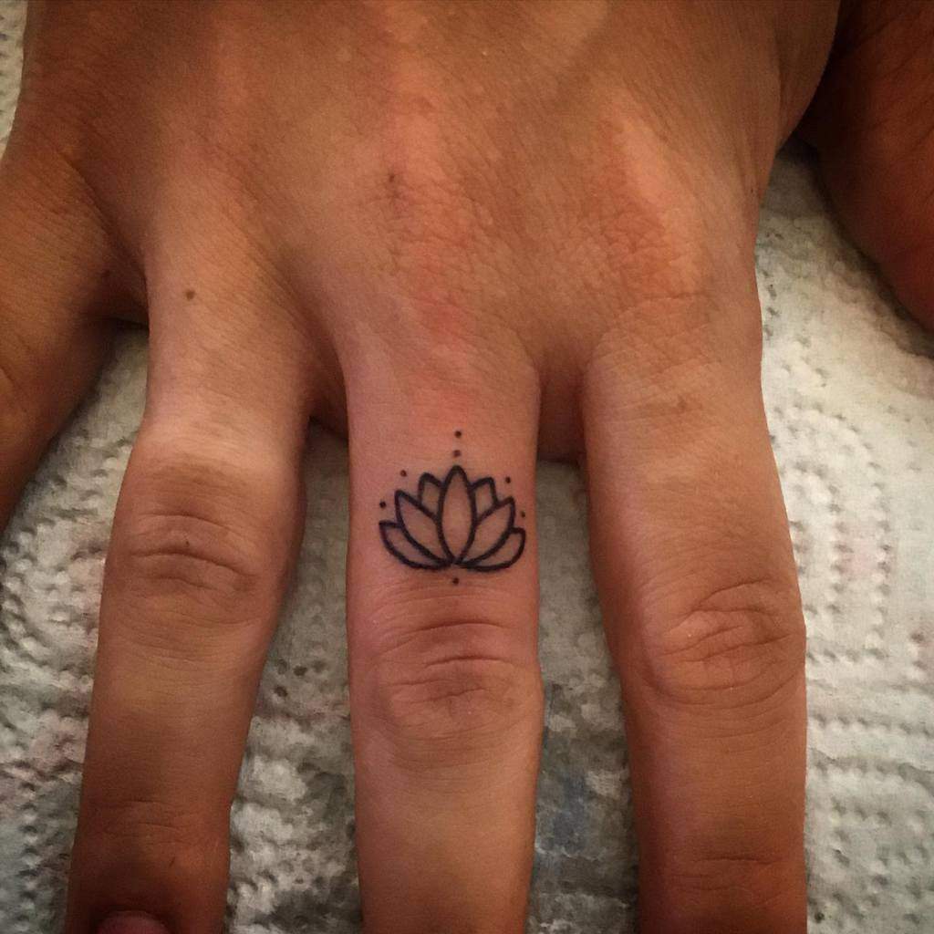 Minimalist Flower Finger Tattoo gattanera74