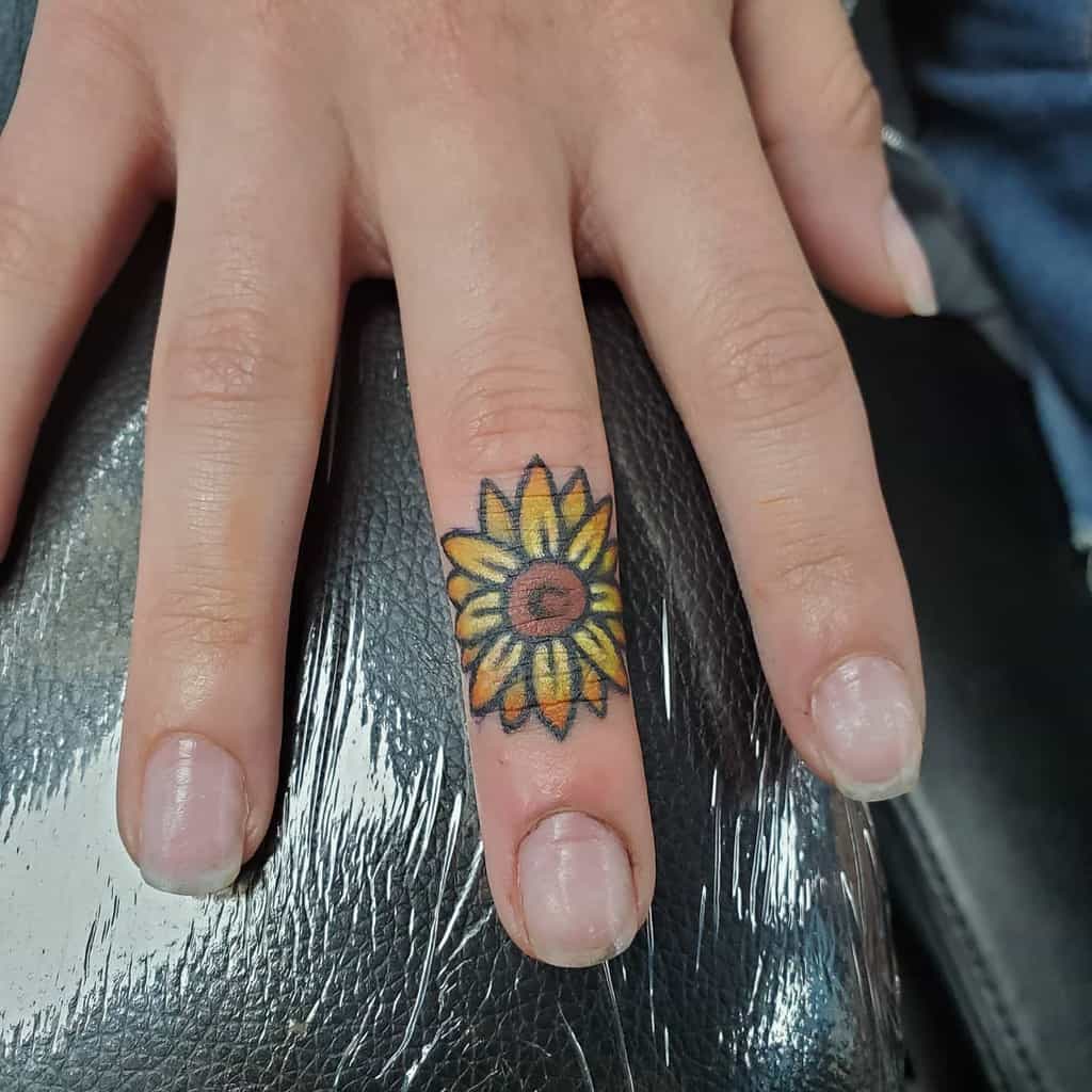 Minimalist Flower Finger Tattoo jeni_moss
