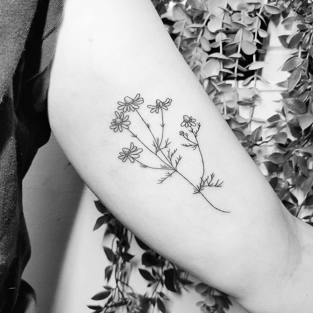 Minimalist Flower Upperarm Tattoo tattoosbyina