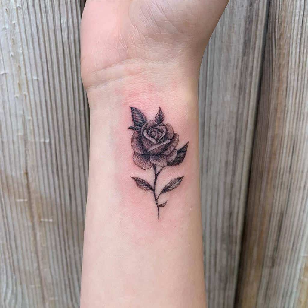 Minimalist Flower Wrist Tattoo becca_tattoo