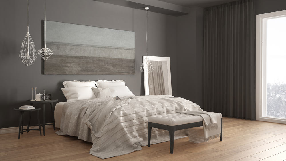 modern minimalist bedroom pendant lights wood floorboards