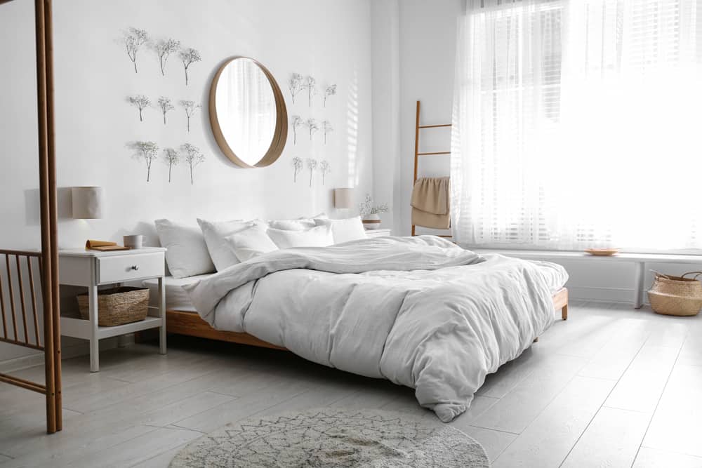 modern boho minimalist bedroom platform bed wall mirror